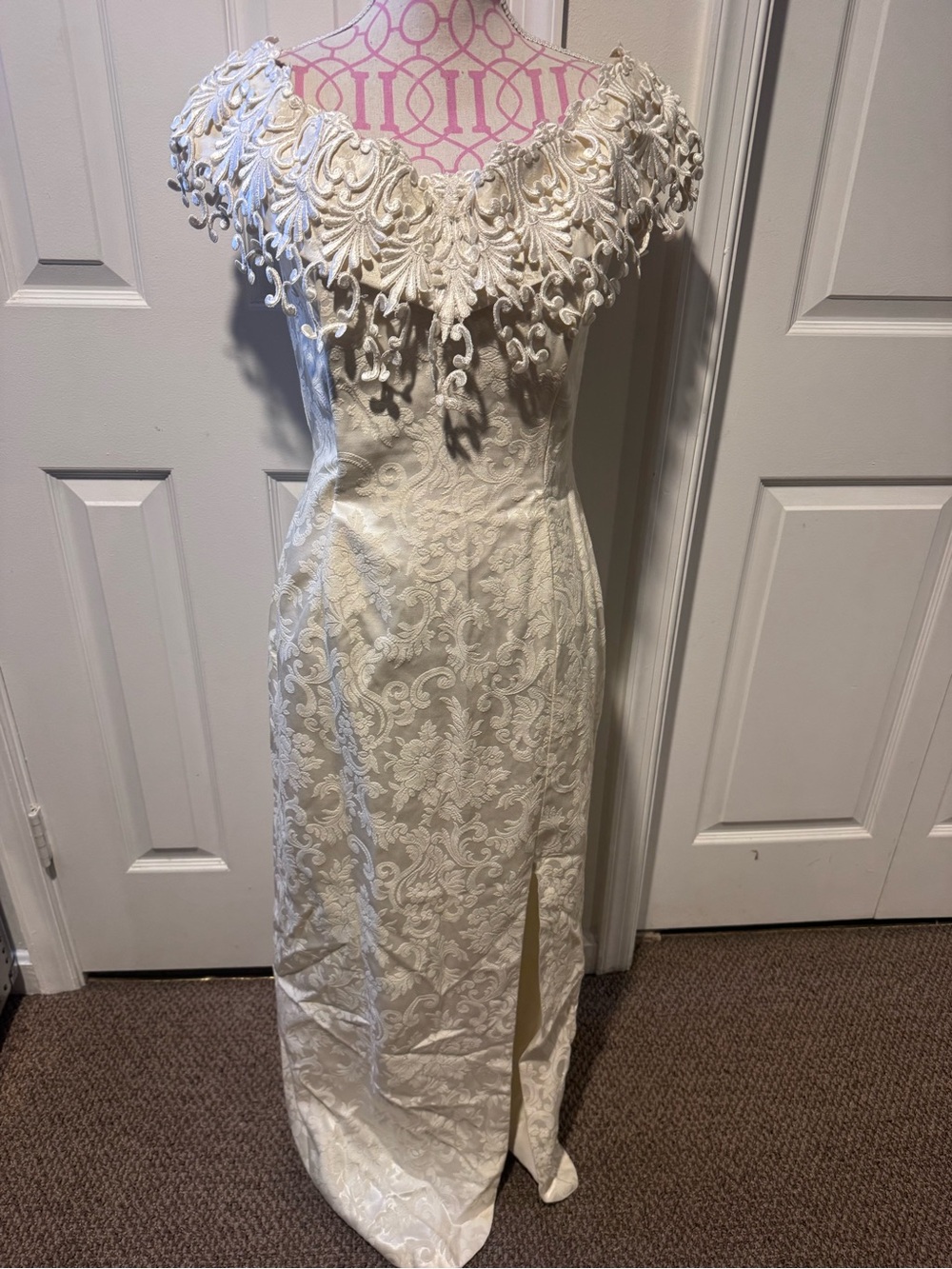 Vintage Ivory Lace Evening Gown with Ornate Off-Shoulder Detail
